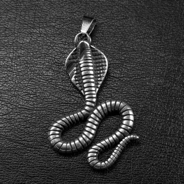 Dije Cobra Real